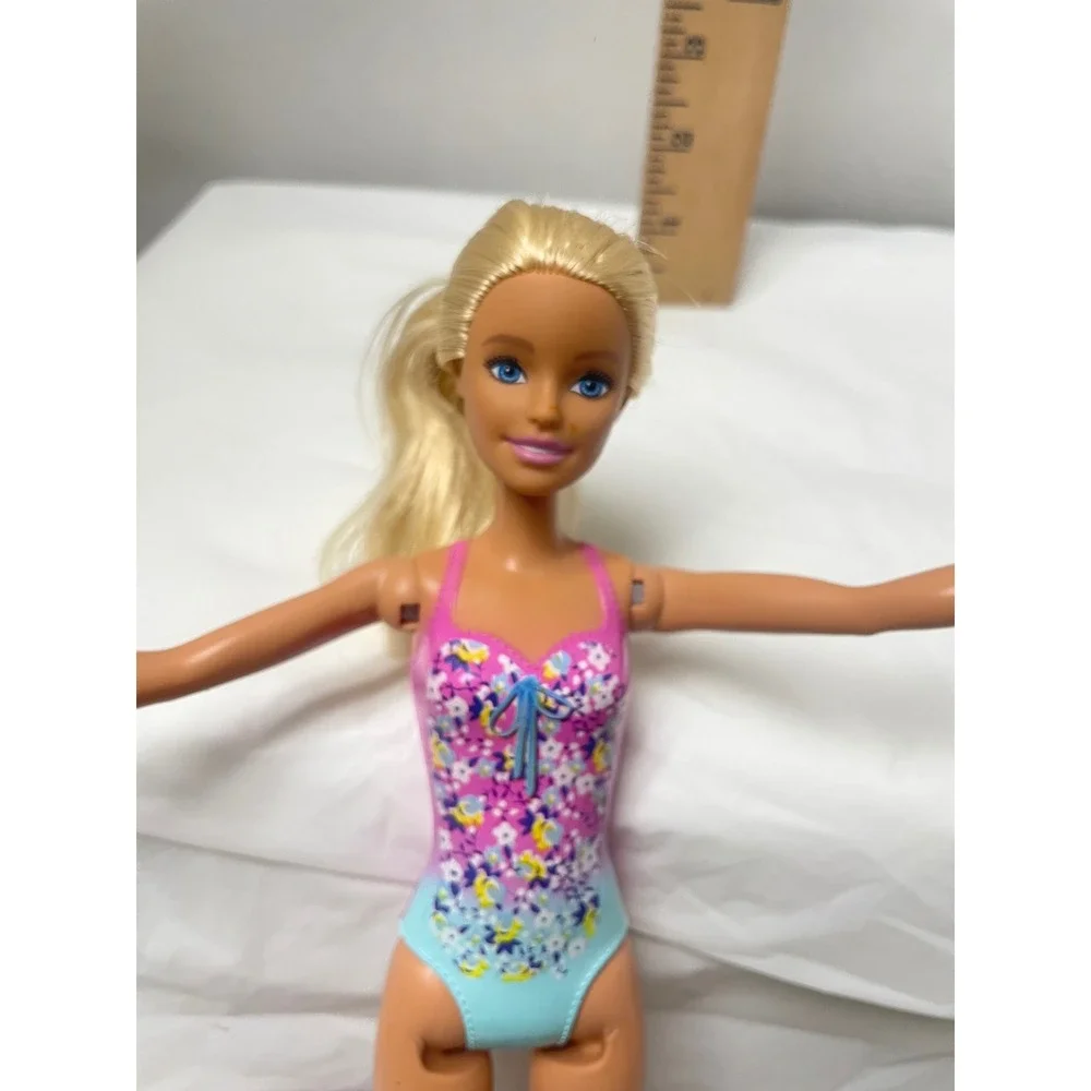 Mattel Barbie Doll 2019 Molded Pink Floral Swimsuit Blonde Hair Blue Eyes 11.5in
